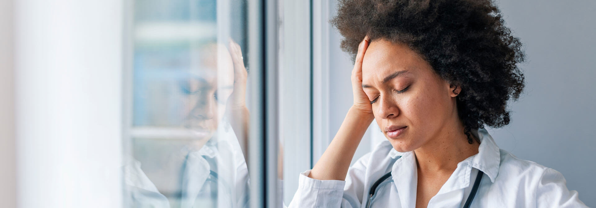 Female Doctor With Headache