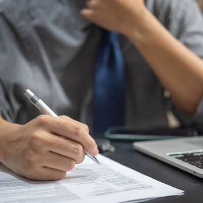 Person Filling Out Form